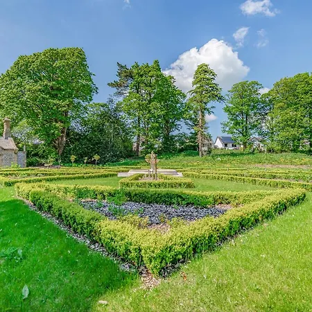 Daire The Wilfred Stone Cross Mansion